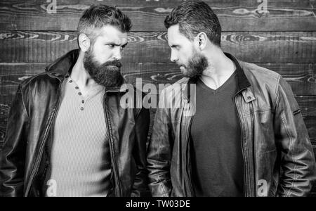 Exude masculinity. Confident competitors strict glance. Masculinity concept. Masculinity attributes. Brutality confidence and masculinity interconnection. True man temper. Men brutal bearded hipster. Stock Photo