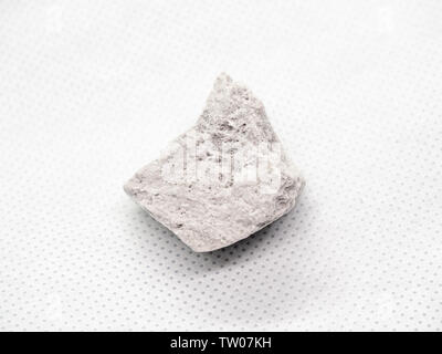 Geological specimen of natural white Pumice (pumicite, volcanic rock) on white background Stock Photo