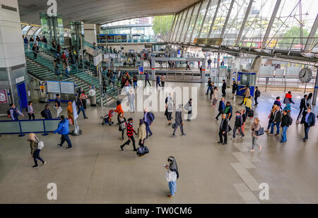 Stratford, London, UK - May 16, 2019: Looking down on the concourse at Stratford Station with passengers crossing between lines. Stock Photo