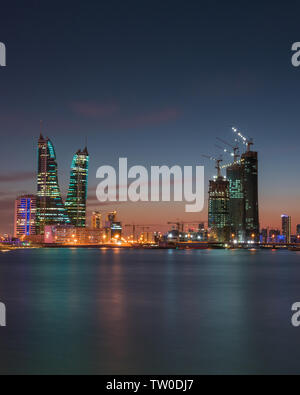 Aerial view of the illuminated Bahrain World Trade Center and Bahrain ...