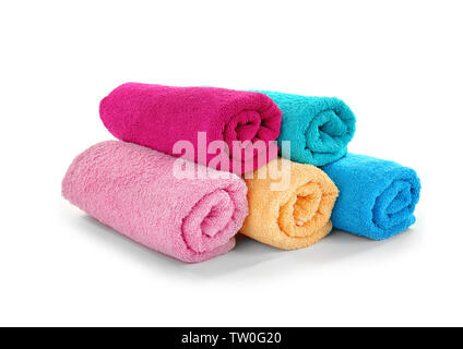 Pile of rolled towels isolated on white Stock Photo