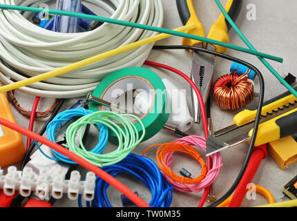 Different electrical tools on table, closeup Stock Photo