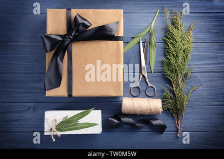 Crafted Christmas gifts and accessories on table Stock Photo