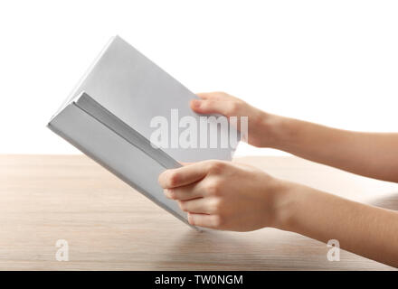 Book with blank pages in female hands Stock Photo
