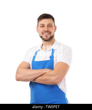 Handsome man in blue apron isolated on white background Stock Photo