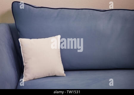 Blank soft pillow on cozy couch Stock Photo