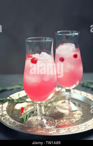 Glasses with delicious wine spritzer on silver tray Stock Photo