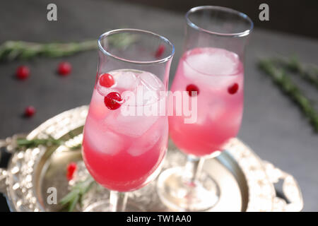 Glasses with delicious wine spritzer on silver tray Stock Photo