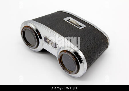 Vintage binoculars, made in Japan, isolated on white background, close-up Stock Photo