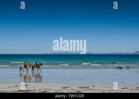 Beach riding at Hov, Gimsoya, Lofoten Islands, Norway.