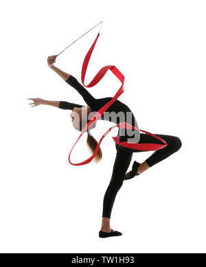 Young girl doing gymnastics with ribbon on white background Stock Photo