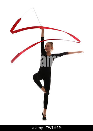 Young girl doing gymnastics with ribbon on white background Stock Photo