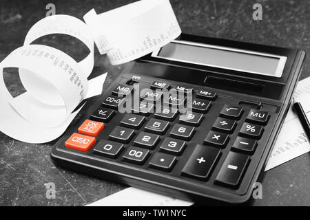 Calculator with adding machine tape, closeup Stock Photo