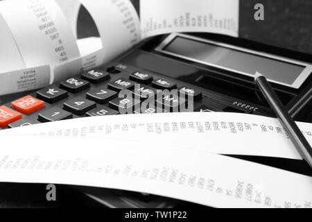 Calculator with adding machine tape, closeup Stock Photo