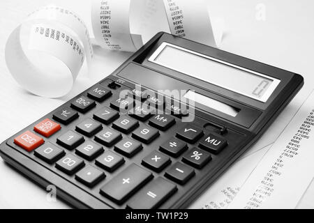 Calculator with adding machine tape, closeup Stock Photo