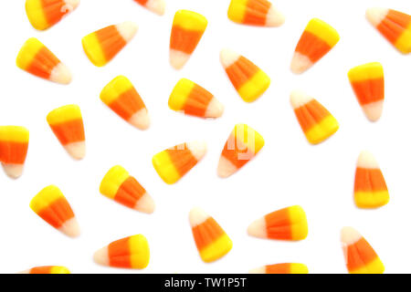 Colorful Halloween candy corns on white background Stock Photo