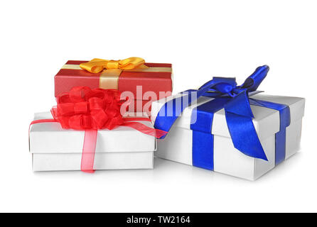 Set of beautiful gift boxes with wonderful bows of shiny ribbons on white background Stock Photo