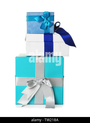 Set of beautiful gift boxes with wonderful bows of shiny ribbons on white background Stock Photo