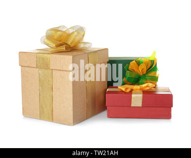 Set of beautiful gift boxes with wonderful bows of shiny ribbons on white background Stock Photo