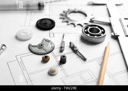 Different kinds of engineering tools on construction drawings background Stock Photo