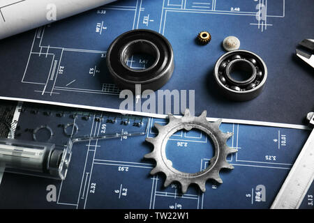 Different kinds of engineering tools on construction drawings background Stock Photo
