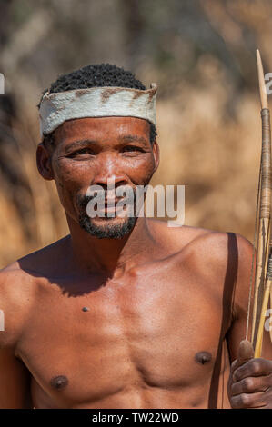 Young male Bushman hunter Stock Photo