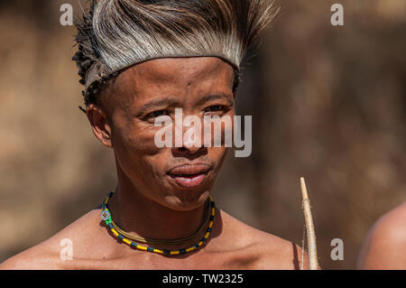 Young male Bushman hunter Stock Photo