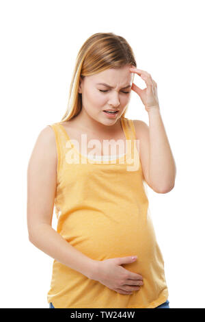Pregnant woman suffering from headaches on white background Stock Photo