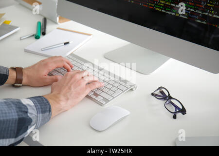 Male hands on keyboard, closeup Stock Photo