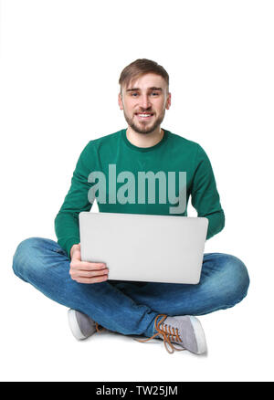 Young programmer using laptop on white background Stock Photo
