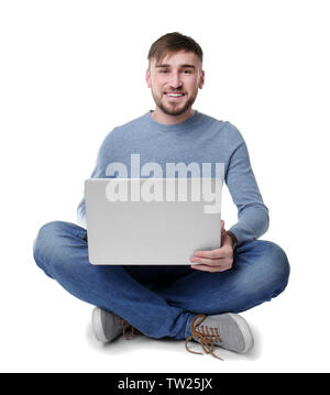 Young programmer using laptop on white background Stock Photo