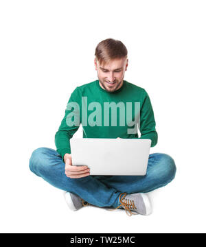 Young programmer using laptop on white background Stock Photo