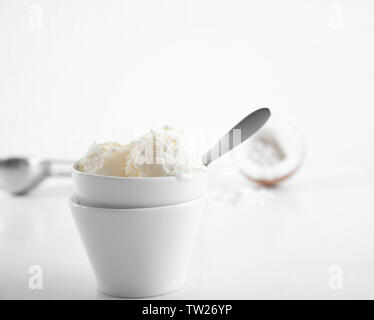 Two Ceramic Bowls With Two Ice Cream Balls On Yellow Backdrop Stock Photo Alamy