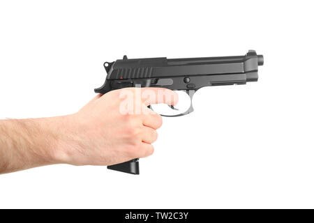 Male hand holding gun on white background Stock Photo