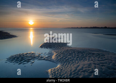 Sunset on the beach at West Wittering in West Sussex. Stock Photo