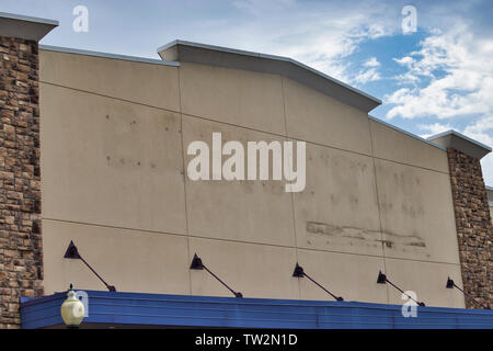 Storefront sign with some sky and clouds. June 2019. Southern Indiana. Babies R Us - Out of Business Stock Photo