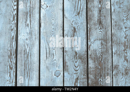 Old wooden ackground of brown boards with partially erased light  blue paint Stock Photo