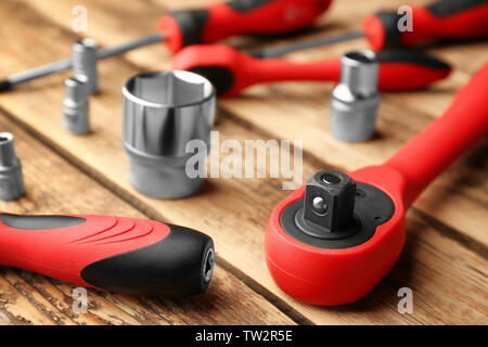 Setting of tools for car repair on wooden background Stock Photo