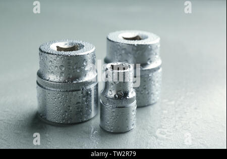 Hand sockets on light background Stock Photo
