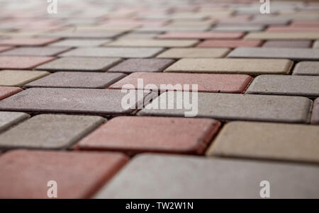 Photo of multi-colored paving stones pattern and background Stock Photo