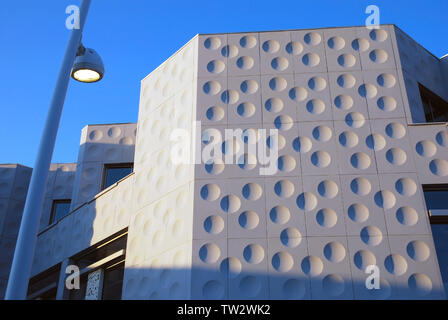 Urban background of modern building and nnovative energy saving LED street light Stock Photo