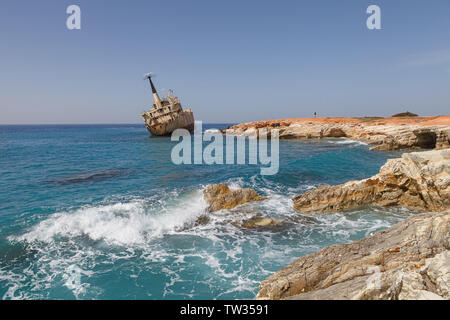 CYPRUS - MARCH, 30, 2018: Rusty abandoned ship Edro III near Paphos beach. The most attractive shipwreck of Cyprus island. Sunny summer day. Stock Photo