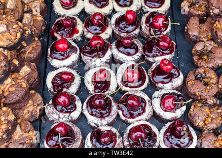 Homemade black forest crumble brownies on a food stall at Stonor Park food festival. Stonor, Henley-on-Thames, Oxfordshire, England Stock Photo