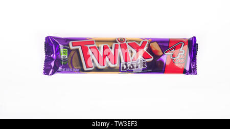 Twix Dark Chocolate 4 pack candy bars in wrapper from Mars Wrigley on white background Stock Photo
