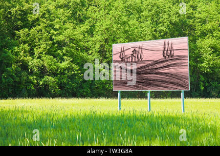 A advertising billboard shows the Tuscany countryside Note for the Ispector: the image in the billboard is my exclusive property