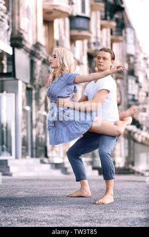 Passionate couple dancing outdoors Stock Photo