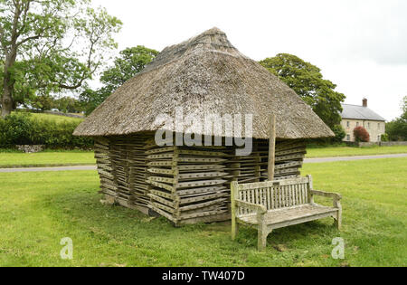 The thatched stack of Hurdles on the village green at Priddy in Somerset. The ash hurdles were originally used to pen the sheep, for which the Mendip Stock Photo