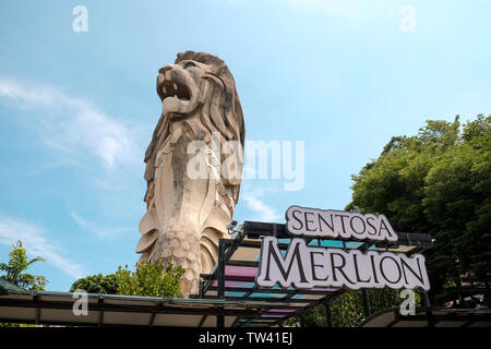 The Sentosa Merlion 37 meter tall viewing tower depicting the mythical creature with a lions head and fish body with 360 degree views over the island. Stock Photo