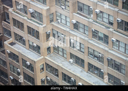 New York, USA. May 2nd, 2019. Manhattan downtown. High angle view of a building facade, Brick wall and glass windows Stock Photo