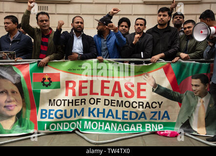 London, UK. 18th June 2019. Loud protest by the London Bangladeshi community, the Bangladesh Nationalist Party (BNP) in front of the Foreign Office, London, asking for the release from prison of Begum Khaleda Zia, the previous Prime Minister of the country and for fresh new independent elections. It's striking that Bangladesh has a long tradition of women Prime Ministers from the main political parties. Credit: Joe Kuis / Alamy Stock Photo